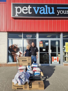 Donation of large cart of supplies from PetValu Lansdowne Street