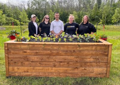 Paul Davis with donated Garden Beds